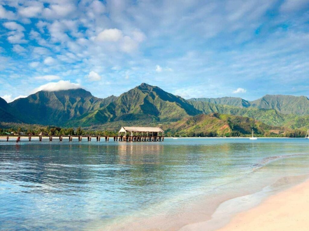 Calm waters at Hanalei Bay during summer on Kauai’s North Shore