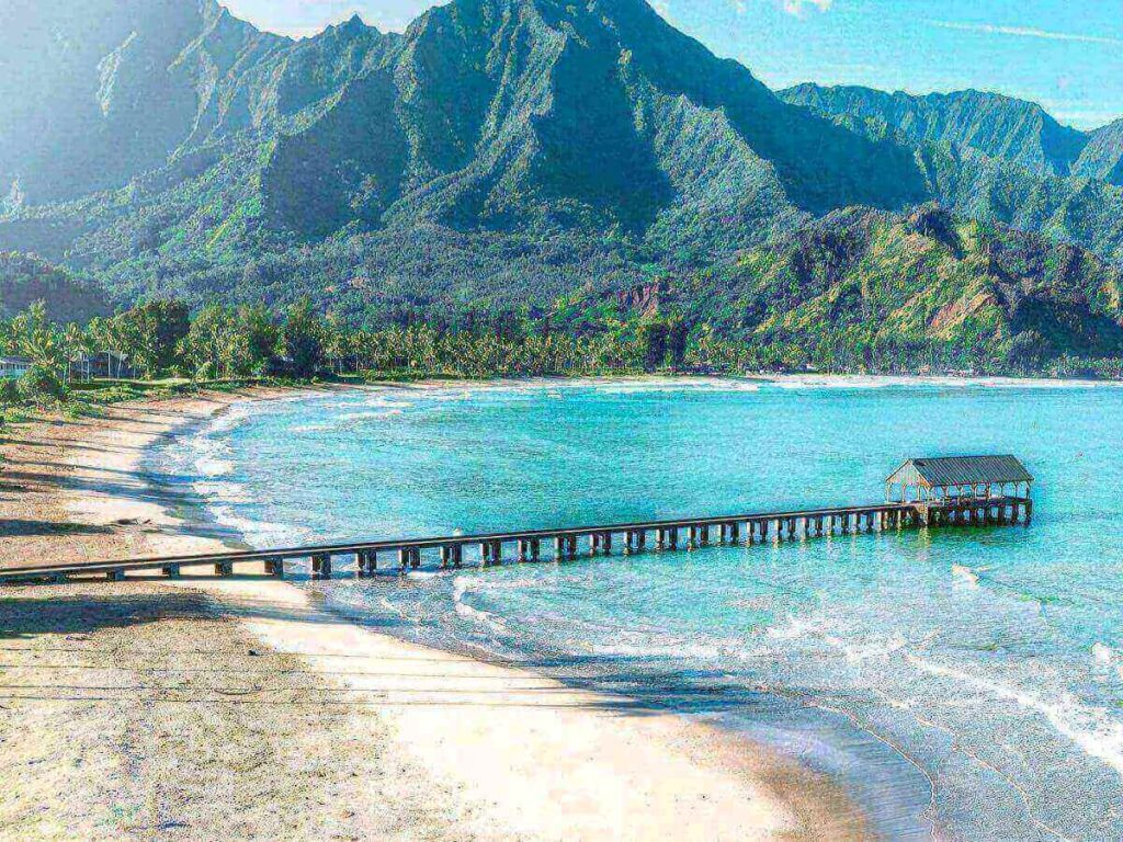Hanalei Bay with lush green mountains on Kauai’s North Shore