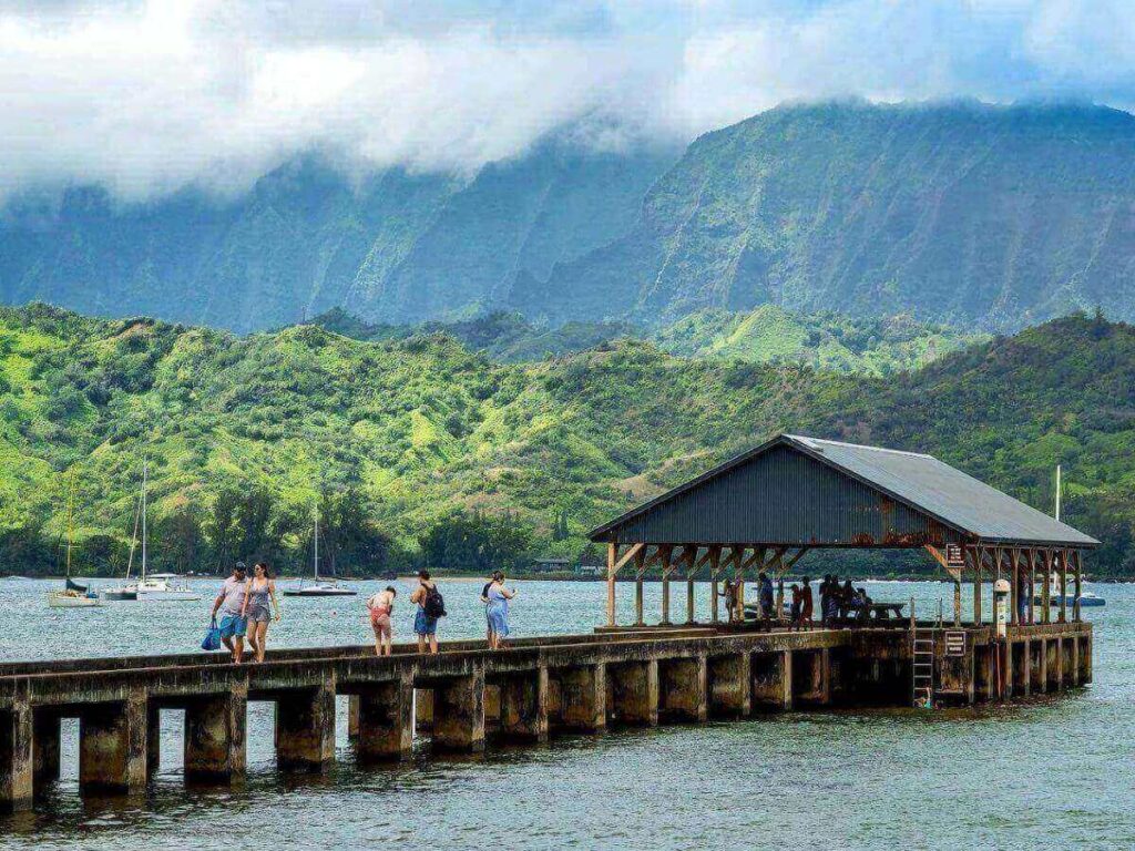 Hanalei Pier extending into calm waters on the North Shore of Kauai