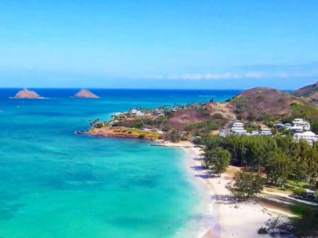 Morning light at Kailua Beach on Oahu with calm turquoise water