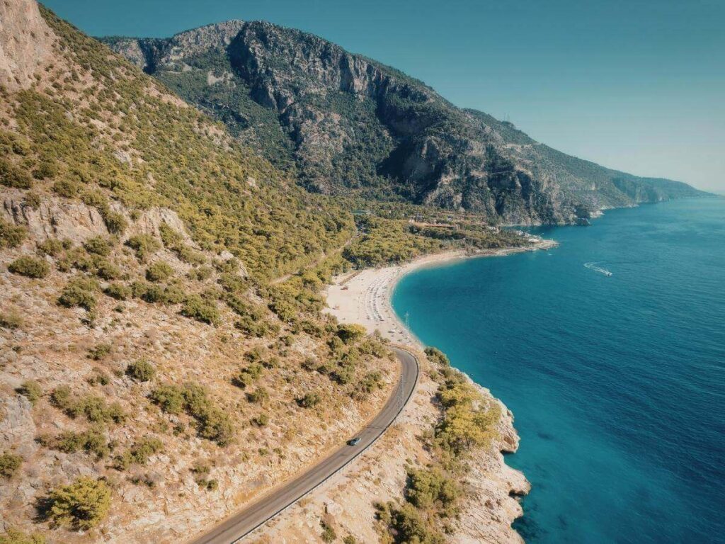 Winding coastal road in Kauai with ocean views