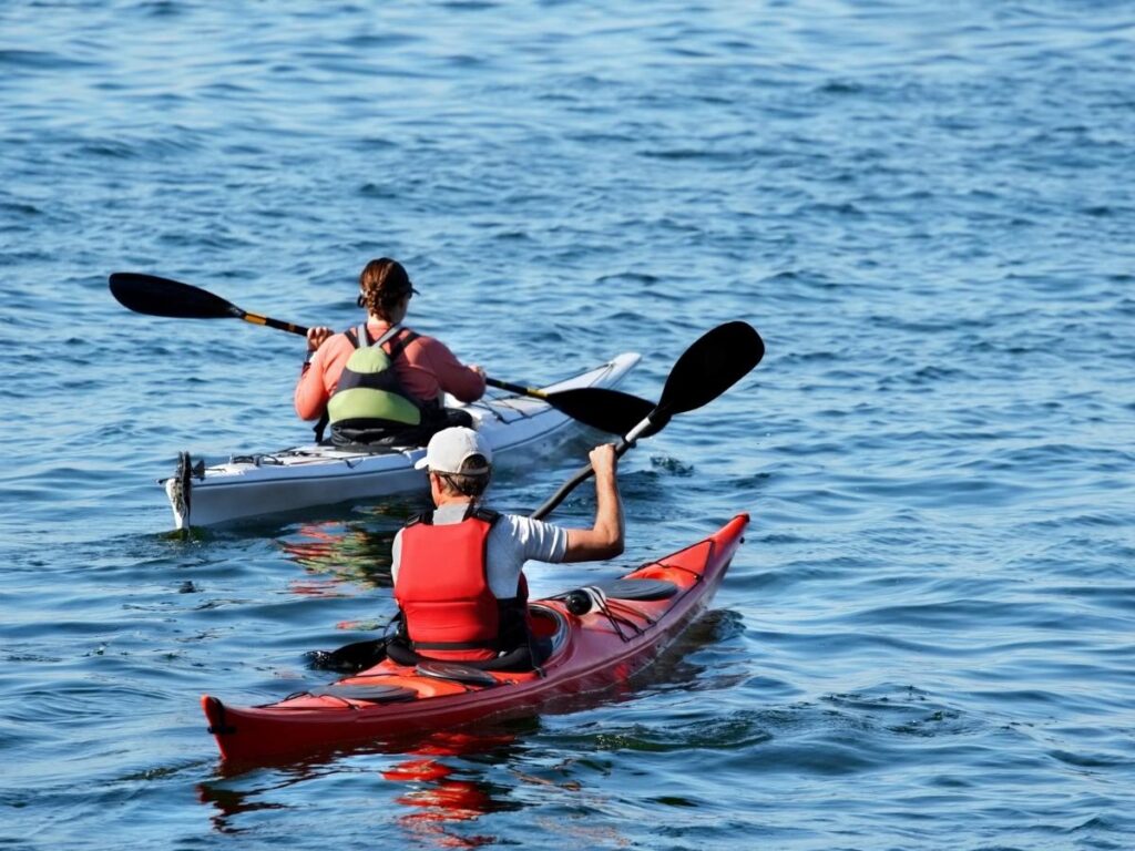 Kayaking across the clear waters of Kealakekua Bay on the Big Island