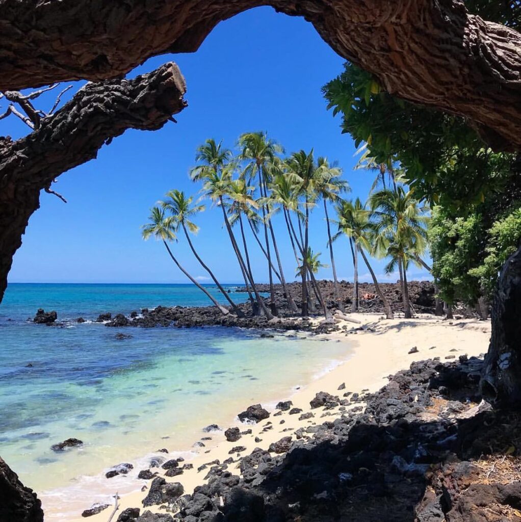 Remote beach with lava rock trail at Kekaha Kai State Park