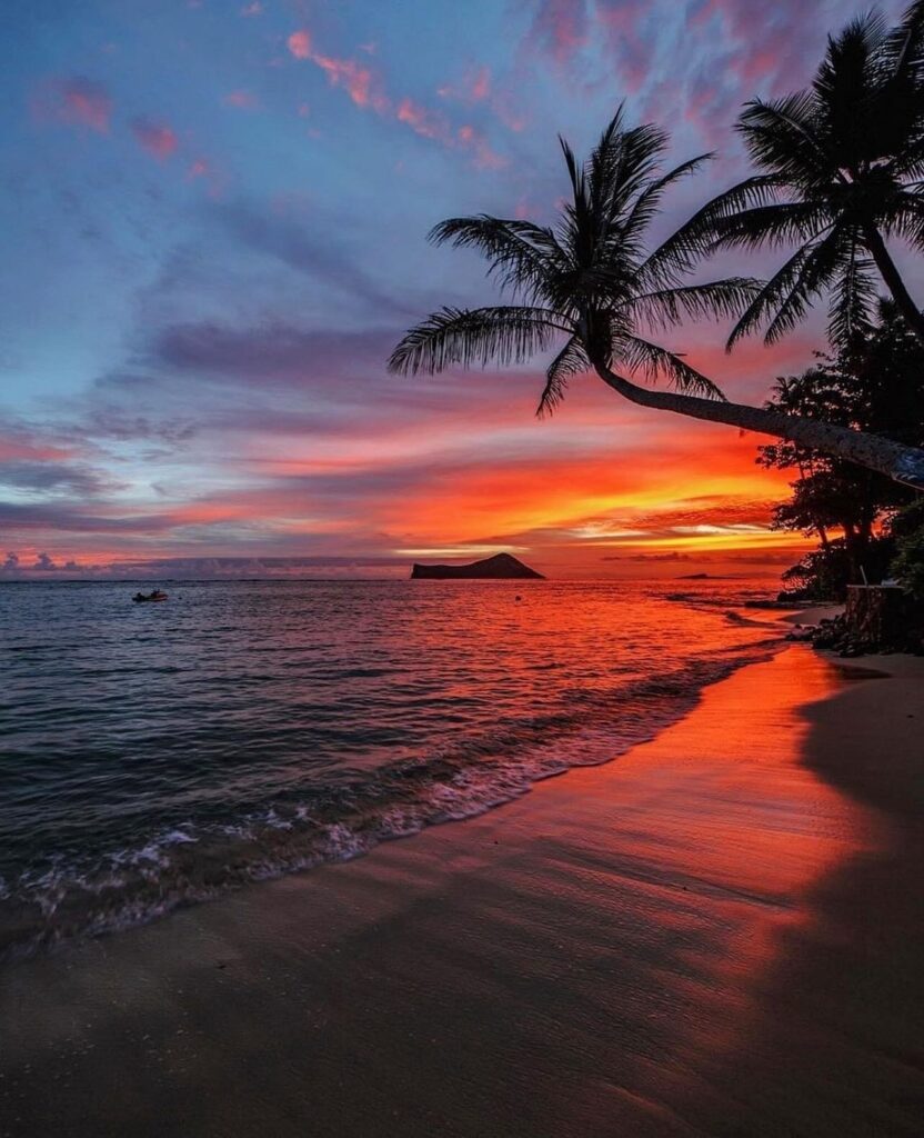 Sunset over Kepuhi Beach with lava rocks and Pacific Ocean on Molokai
