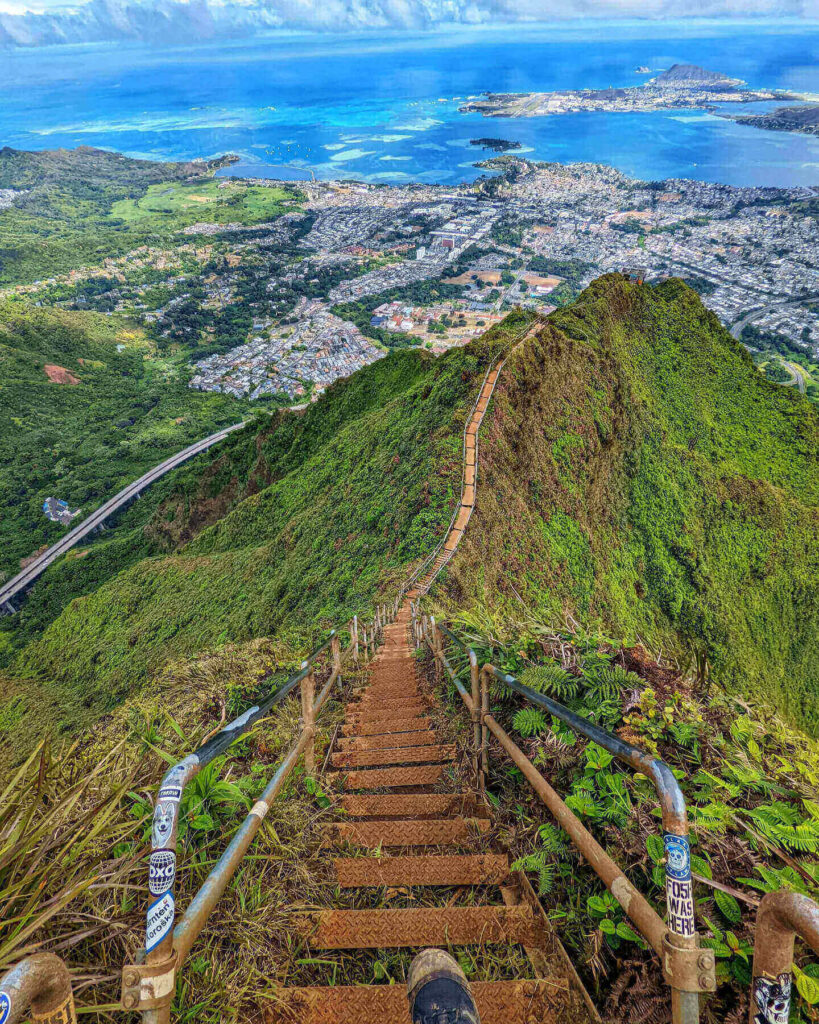 Hikers crossing the hardened lava lake on Kīlauea Iki Trail in Hawaiʻi Volcanoes National Park