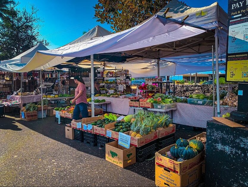 Colorful tropical fruits and handmade goods at Kona Farmers Market