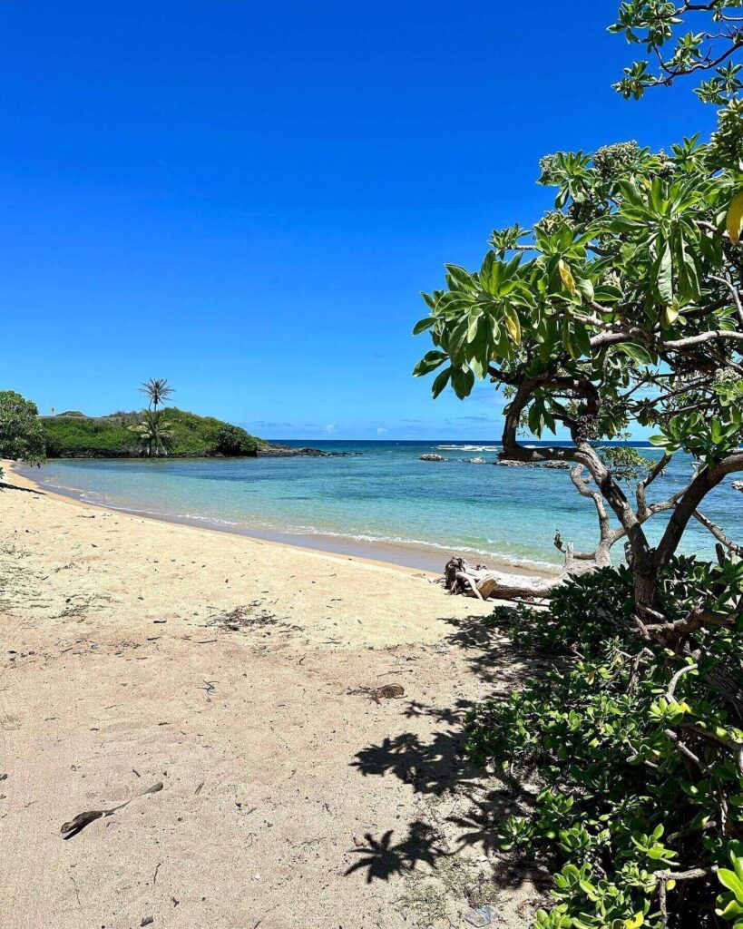Kumimi Beach on Molokai with calm reef-protected water and tropical scenery