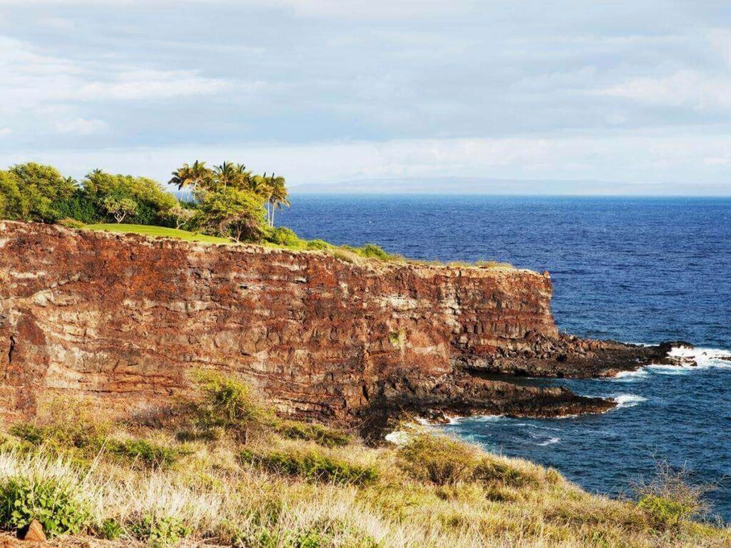 Dramatic coastal cliffs overlooking the Pacific Ocean on Lanai, Hawaii