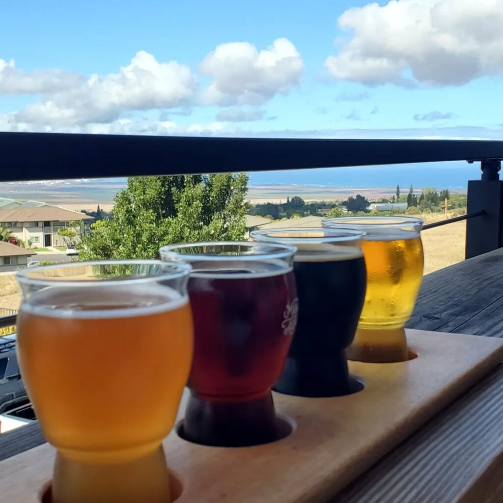 Craft beers on a table at Mahalo Aleworks
