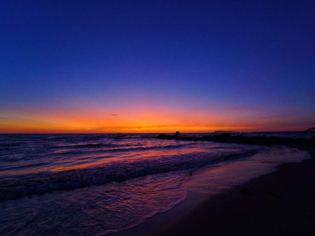 Sunset over a quiet Molokai beach during fall with warm evening light
