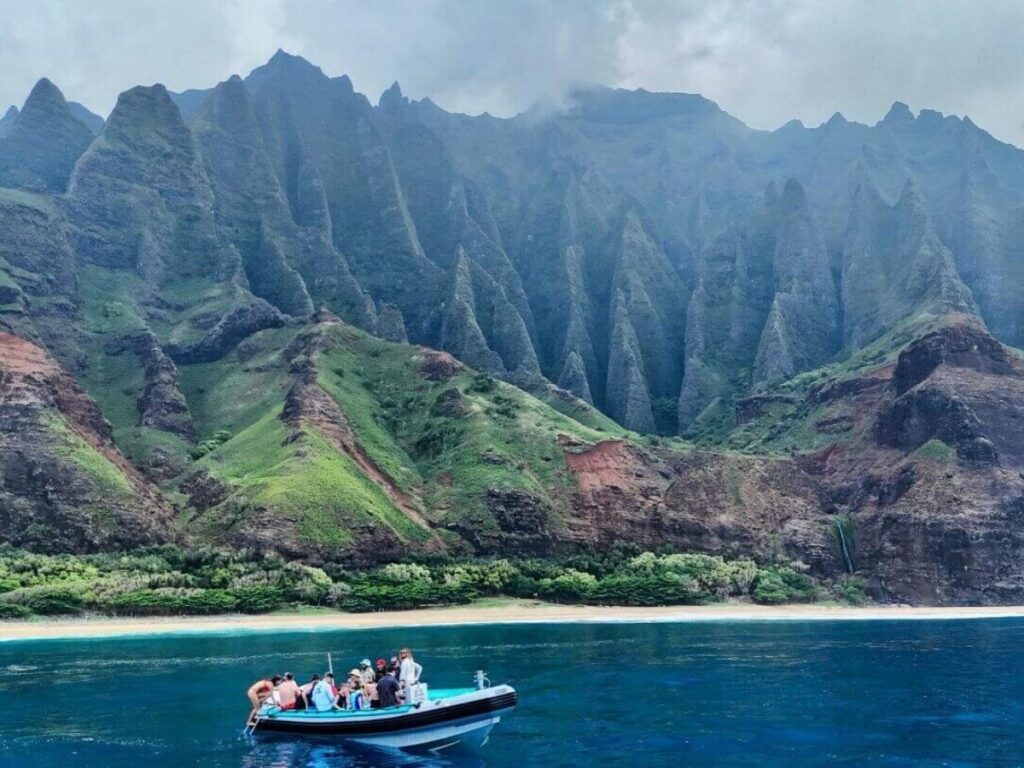 Boat tour along the Na Pali Coast cliffs in Kauai Hawaii