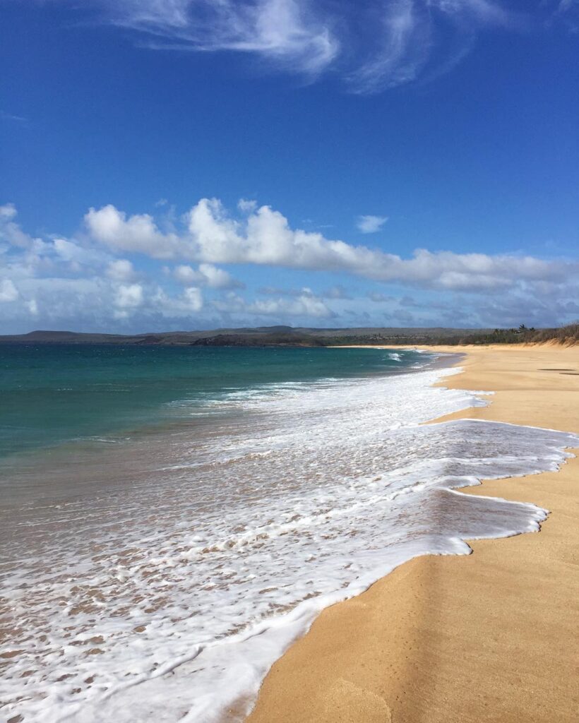 Panoramic view of Papohaku Beach with its long white sand shoreline on Molokai