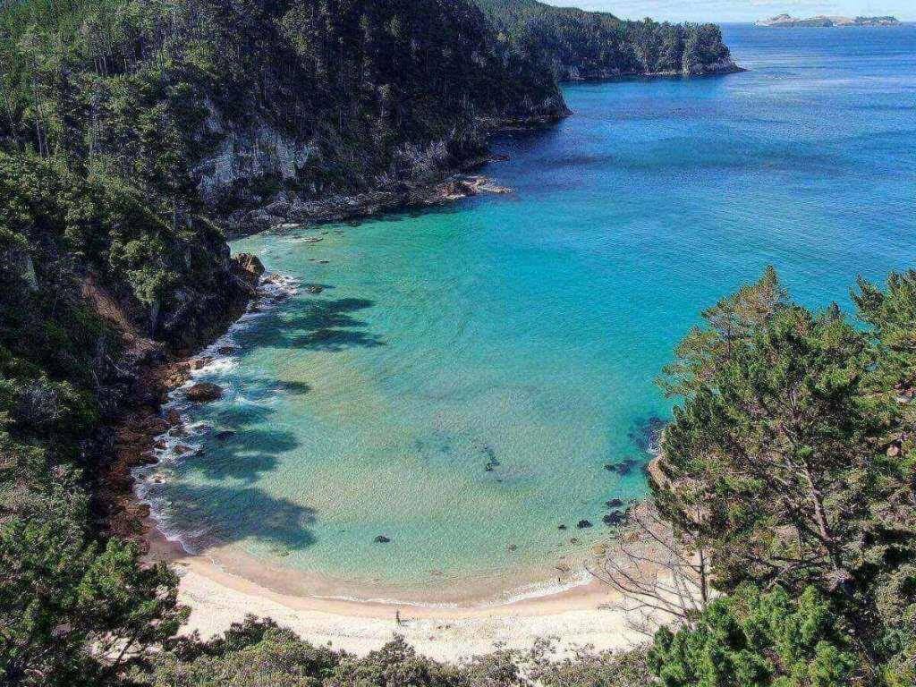 Expansive sandy shoreline at Papohaku Beach on Molokai’s west side