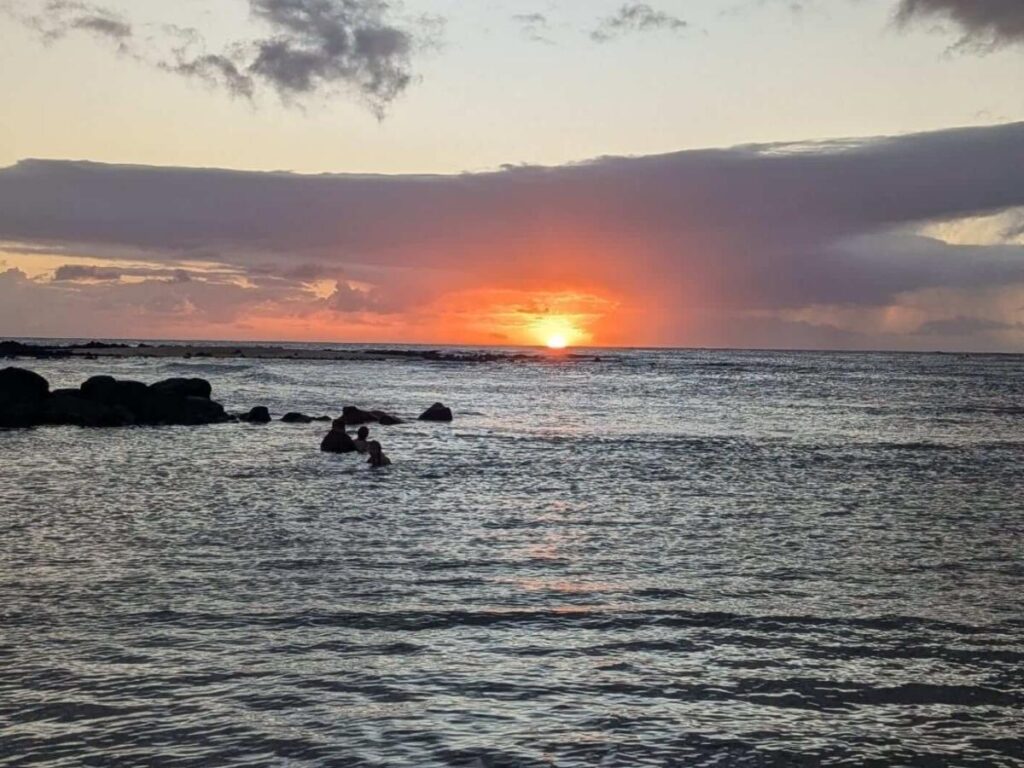 Sunny coastline in Poipu on Kauai’s South Shore with calm ocean