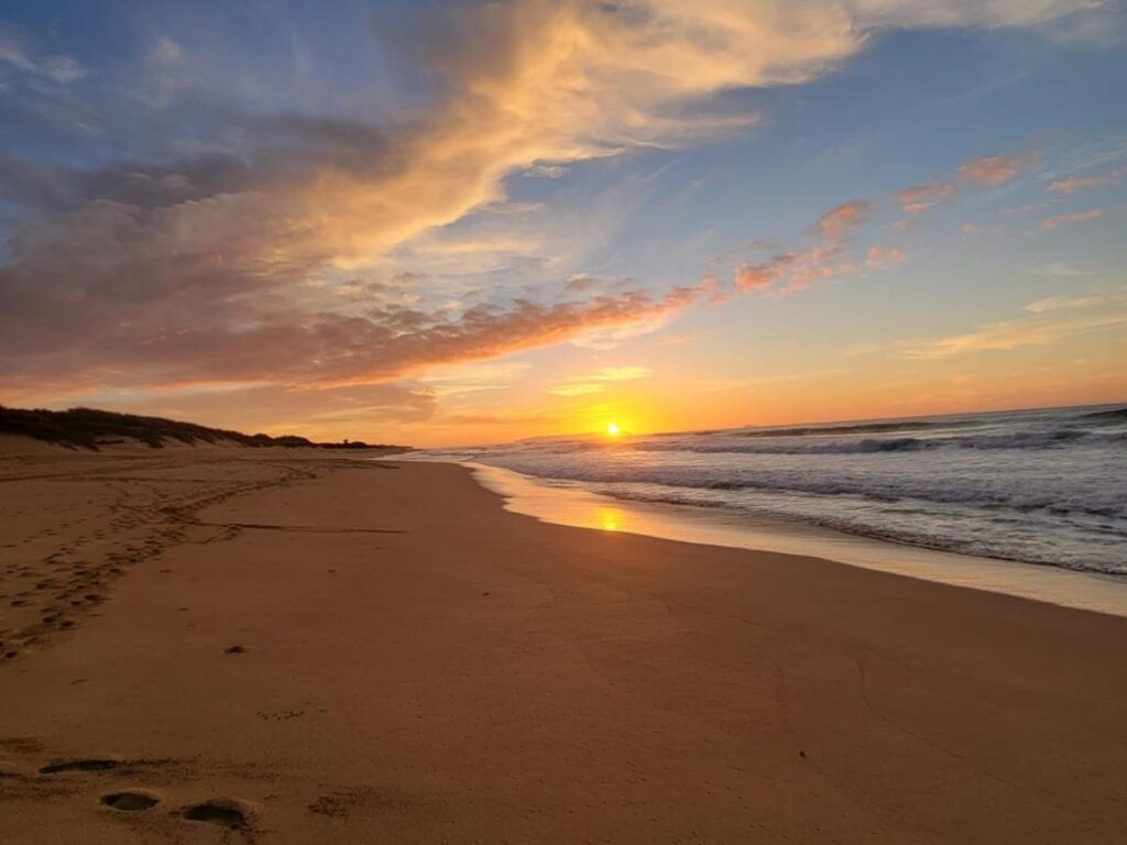 Sunset sky over Polihale State Park beach in Kauai