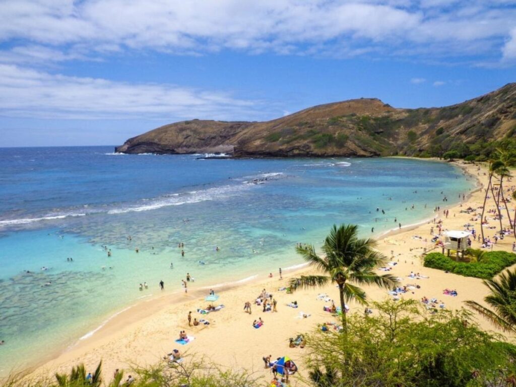 Wide empty shoreline at Polihua Beach on Lanai, Hawaii