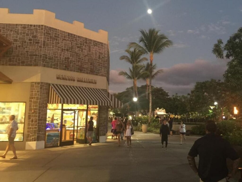 Evening view of Queens’ Marketplace in Waikoloa Beach Resort
