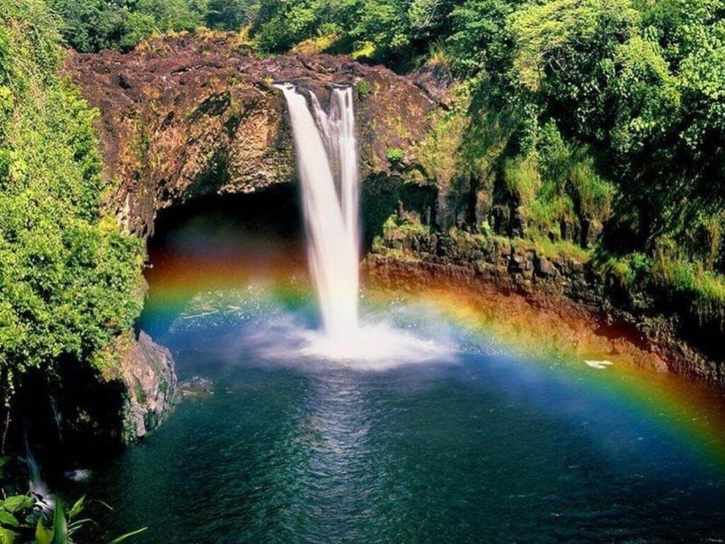 Rainbow forming in the mist at Rainbow Falls in Hilo