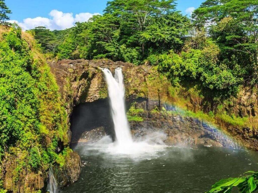 Rainbow Falls in Hilo Hawaii during morning light with mist