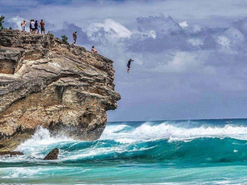 Rocky coastline and waves at Shipwreck Beach on Kauai South Shore