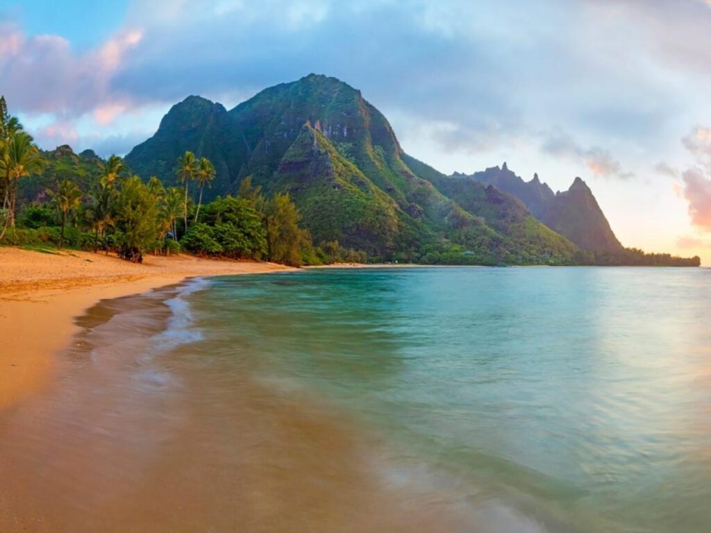 Tunnels Beach with mountain backdrop on Kauai’s North Shore