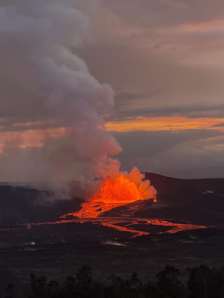 Sunset over volcanic craters and lava fields in Hawaiʻi Volcanoes National Park