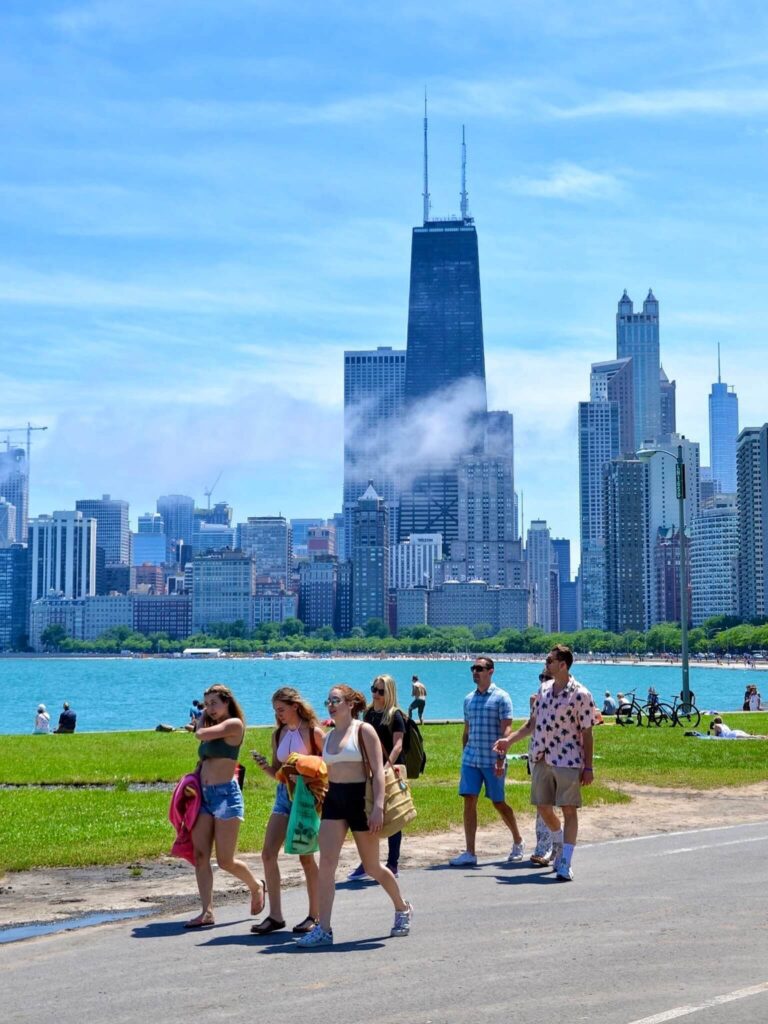 Visitors walking along the Chicago Riverwalk