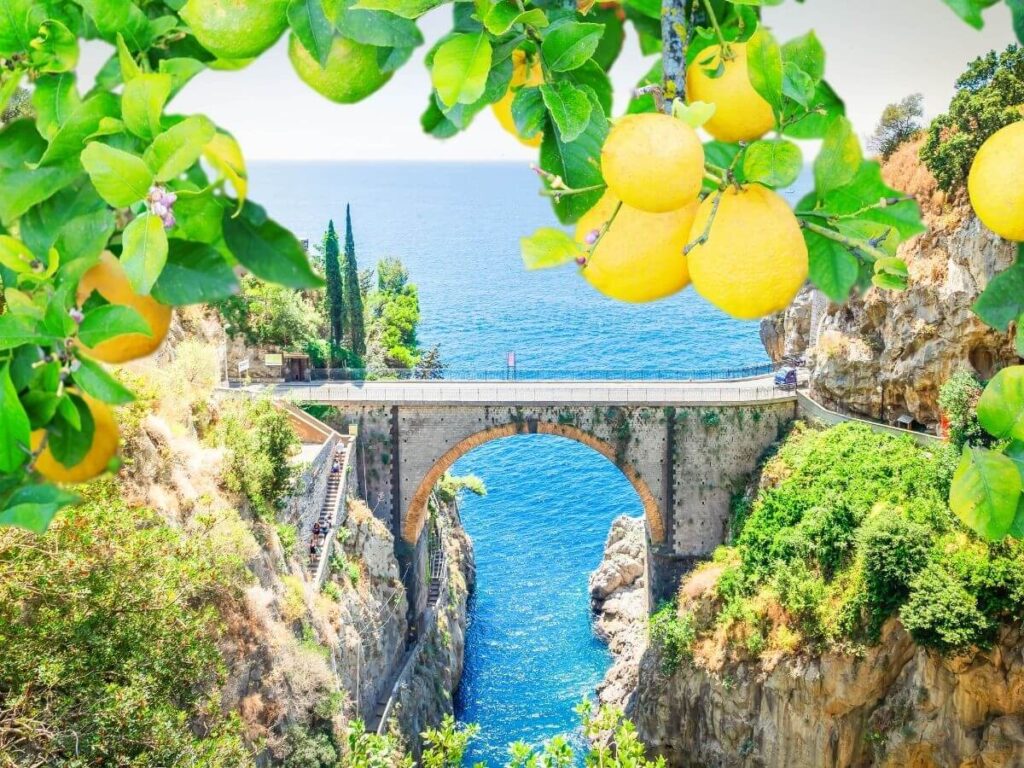 Scenic drive along the cliffside Amalfi Coast road with ocean views