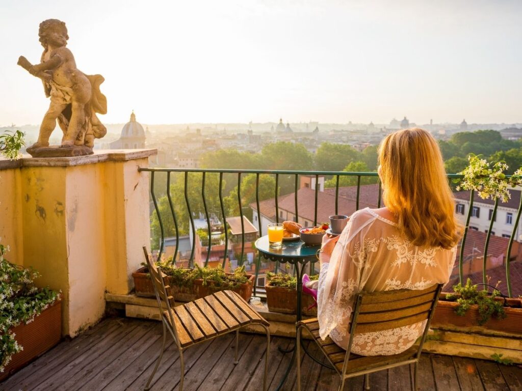 Budget-friendly picnic meal on a balcony during travel
