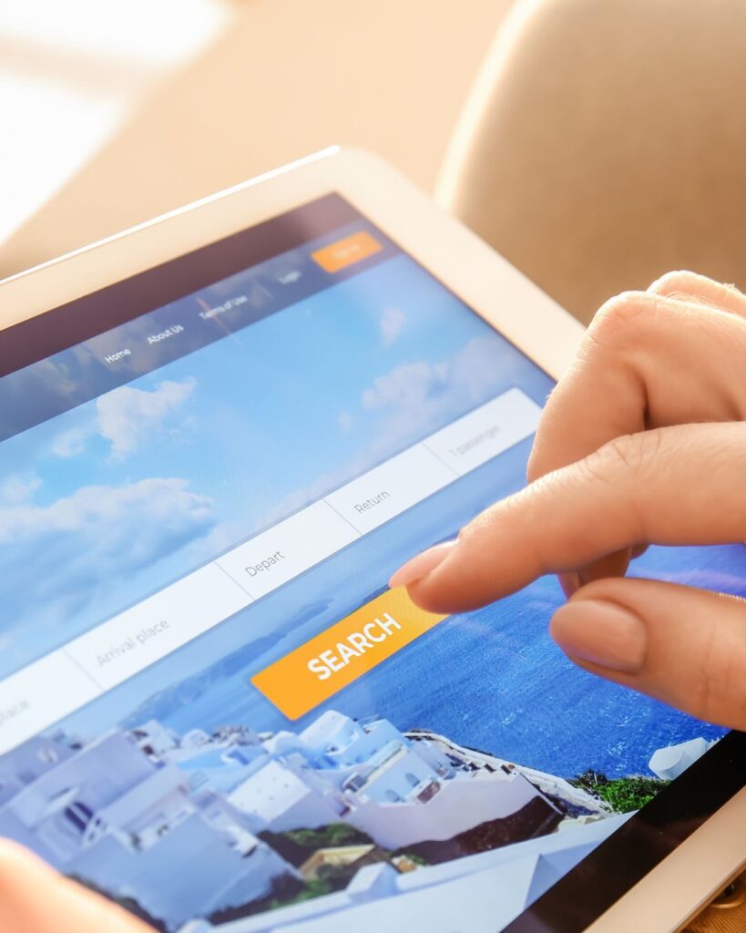 Tablet screen showing a discounted luxury hotel