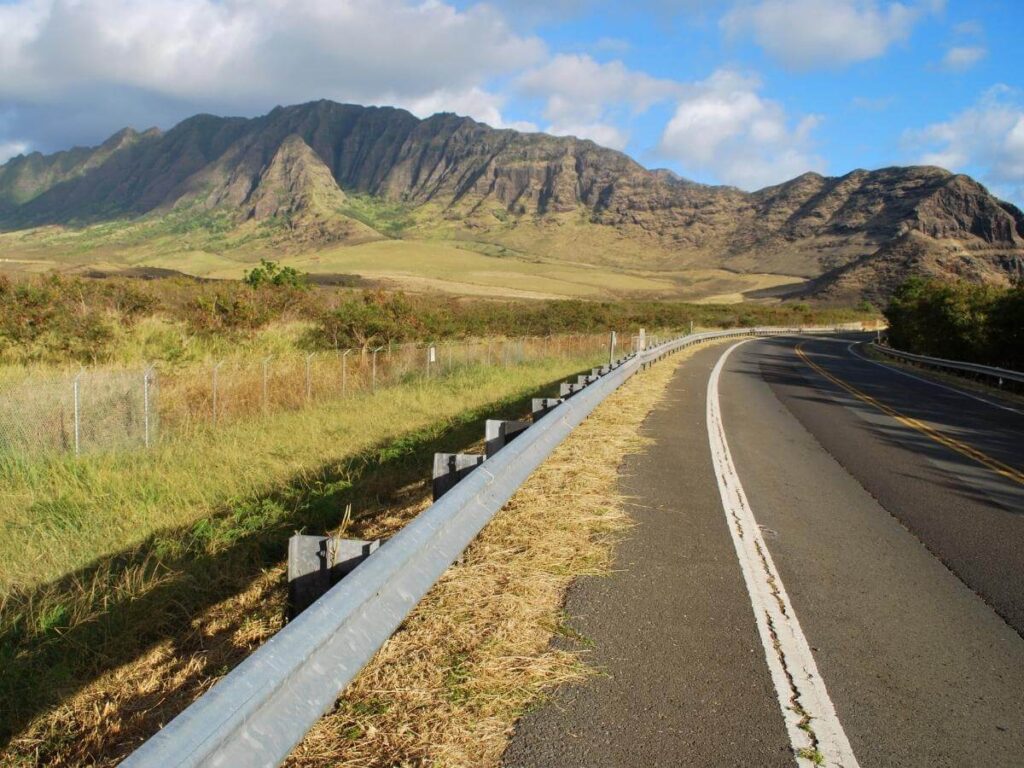 Scenic drive along Farrington Highway in Waianae, Oahu with ocean and mountain views