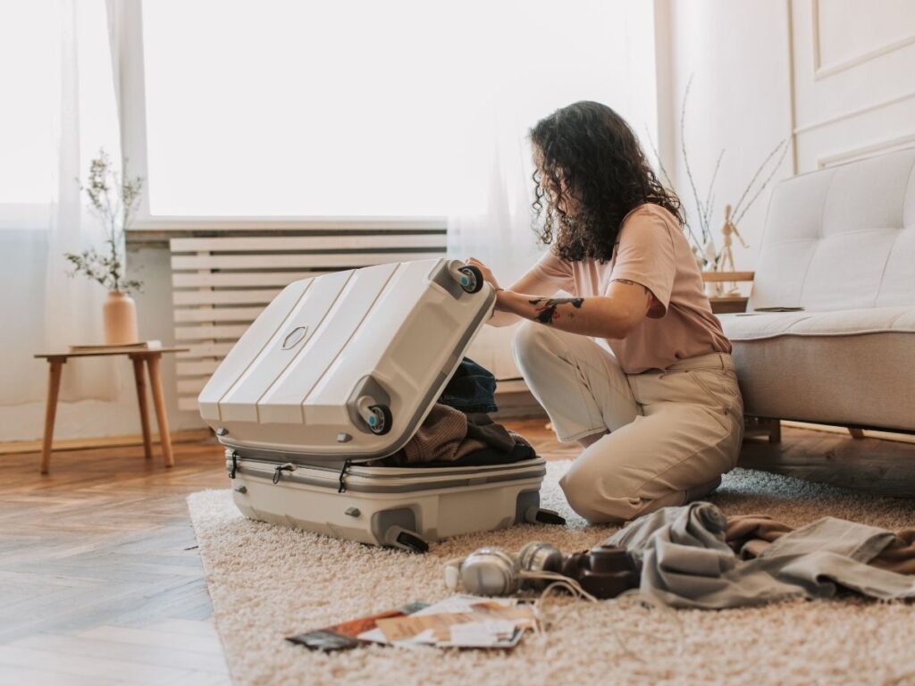 checking suitcase for bed bugs