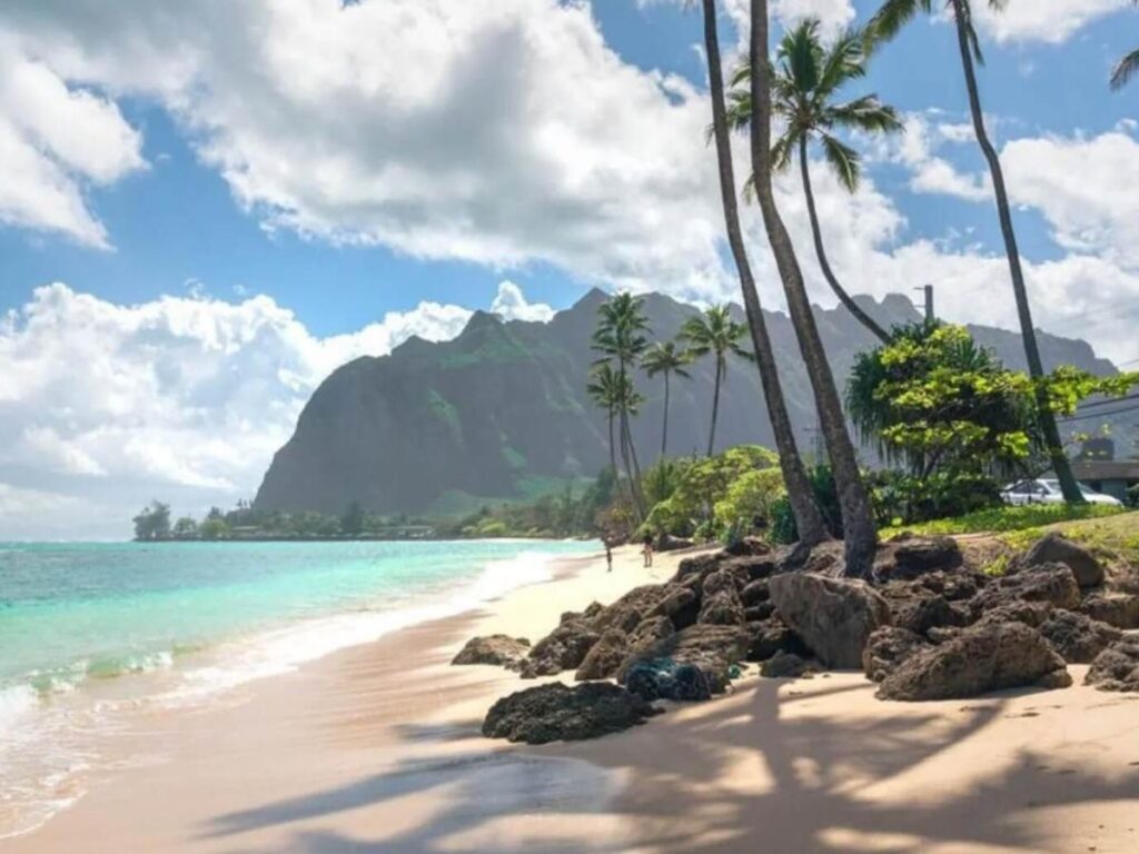 Wide sandy shoreline at Kailua Beach Park in Oahu with turquoise water