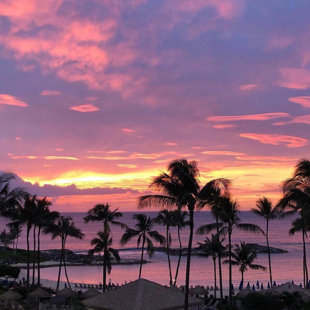 Sunset over lagoon in Kapolei Oahu with calm ocean water