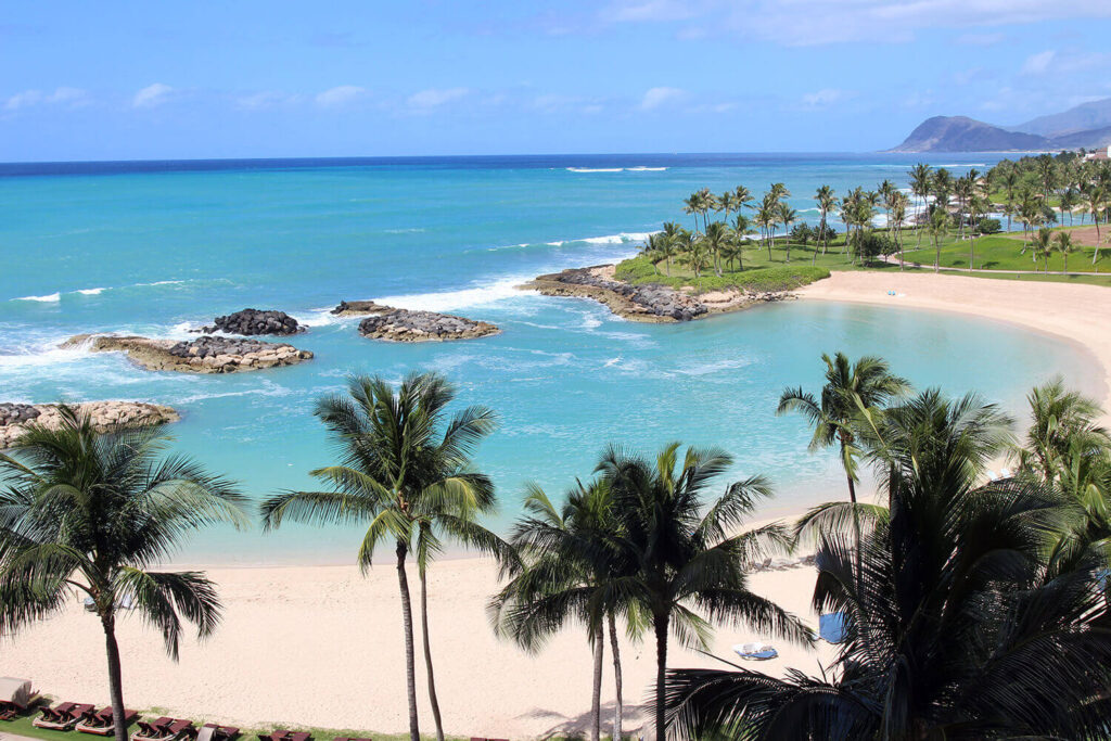 Wide view of Ko Olina lagoons in Kapolei Oahu with calm ocean water