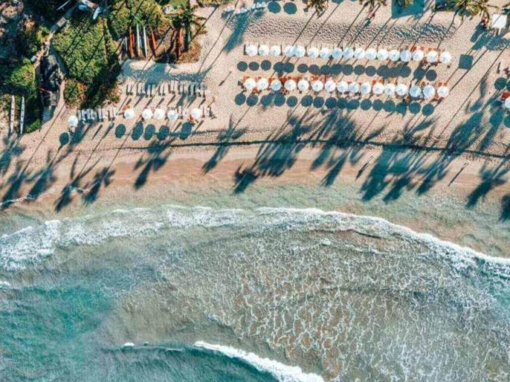 Wide golden sand shoreline at Makena Beach in South Maui