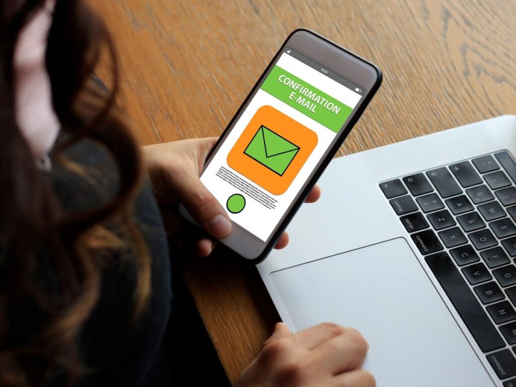 Rental car booking confirmation email on smartphone