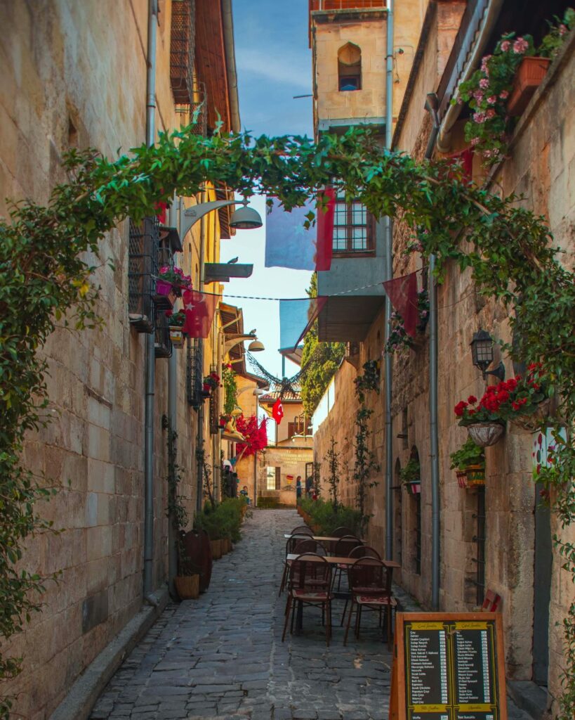 Small outdoor café tucked in a quiet European alleyway