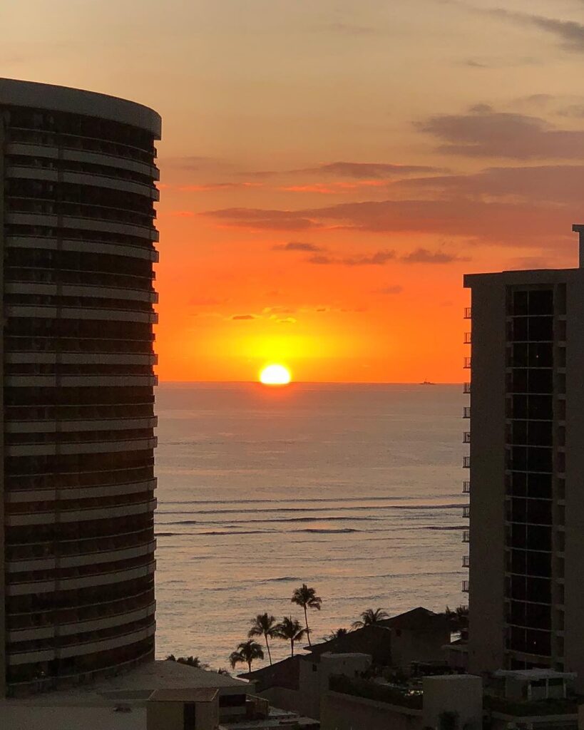 Rooftop sunset view from Sky Waikiki overlooking Honolulu and the Pacific Ocean