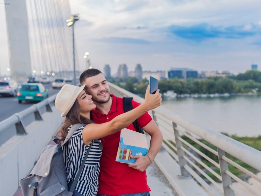 Tourist taking photo at a disappointing landmark
