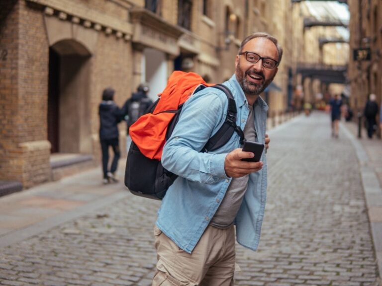 Solo traveler navigating a foreign city with phone in hand