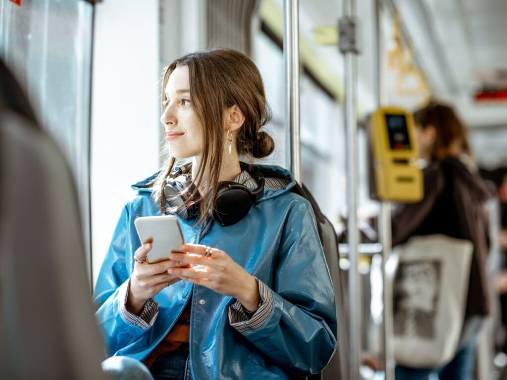 Tourist navigating local public transportation instead of taxis