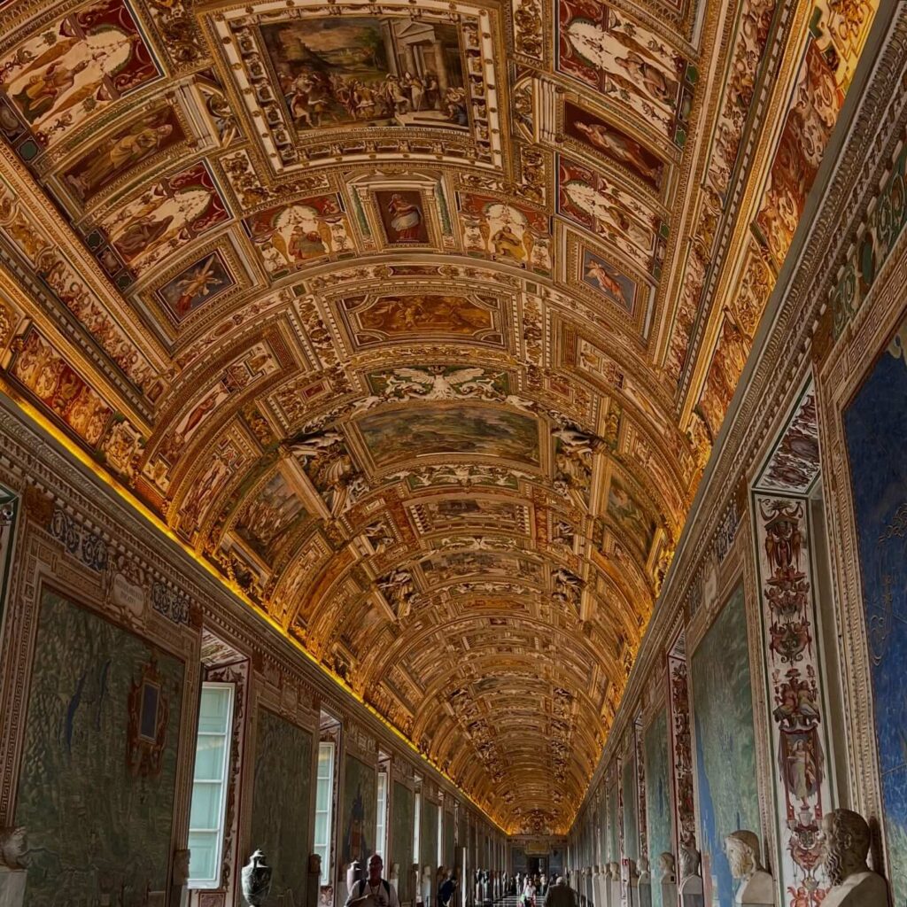 Tourists admiring the Sistine Chapel ceiling at the Vatican