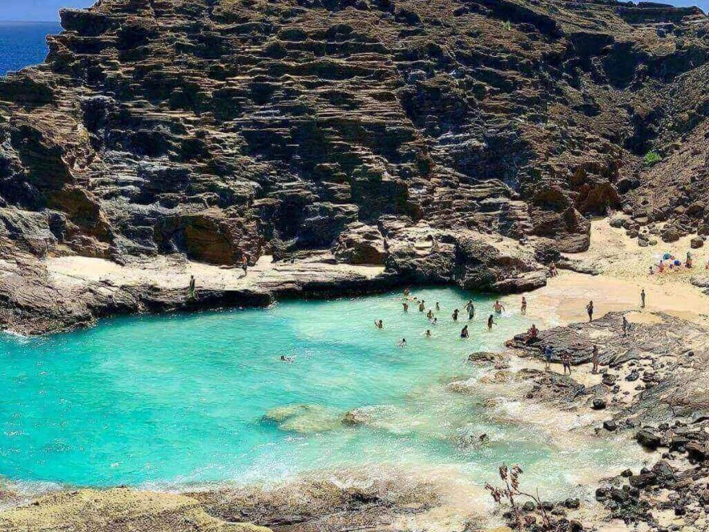 Local families enjoying a beach day in Waianae on Oahu’s west side