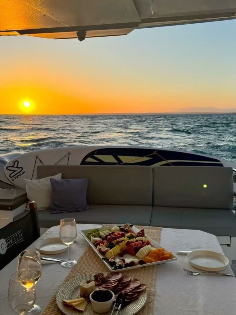Dinner cruise sailing along the Waikiki coastline during sunset