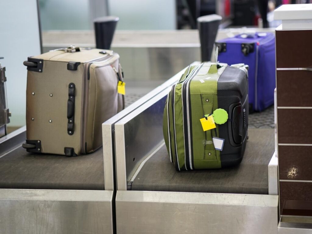 Airline luggage tag being scanned by an airport machine