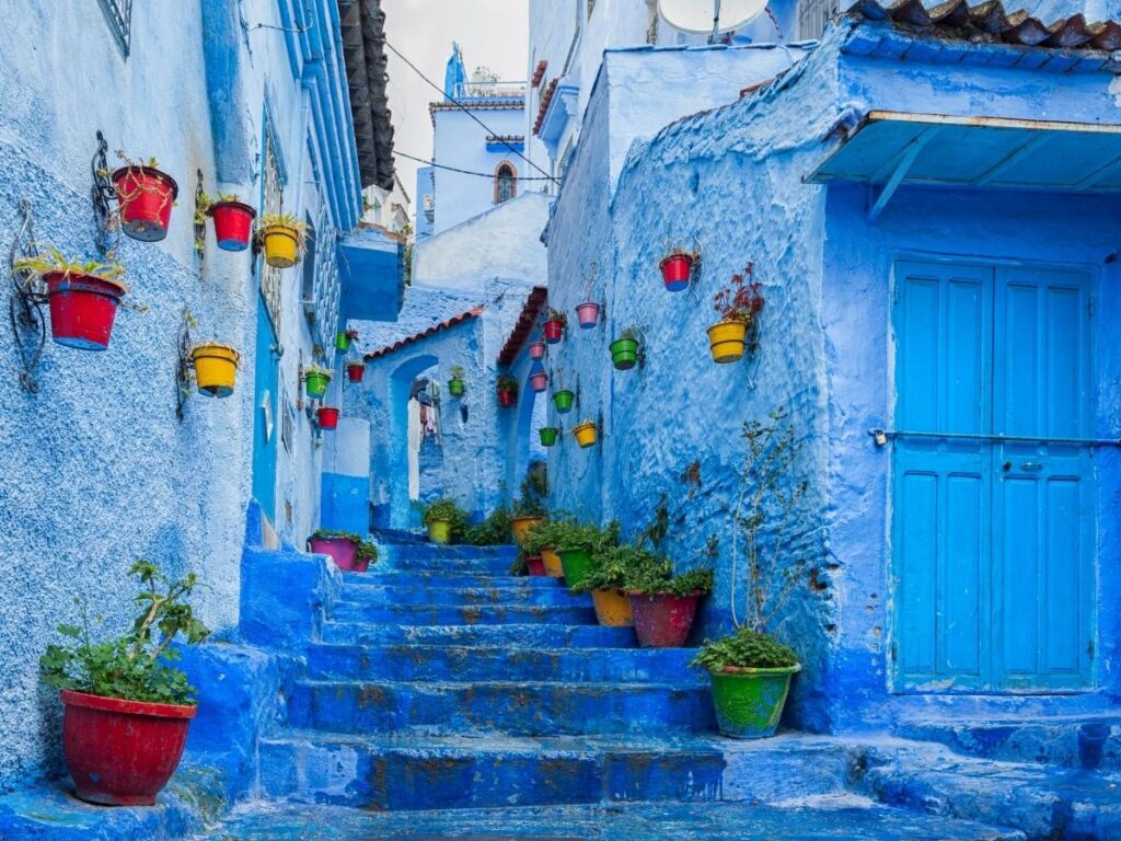 Blue-painted alley with steps in Chefchaouen, Northern Morocco