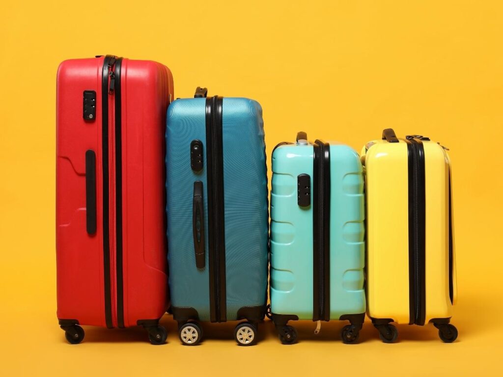 A lineup of colorful suitcases