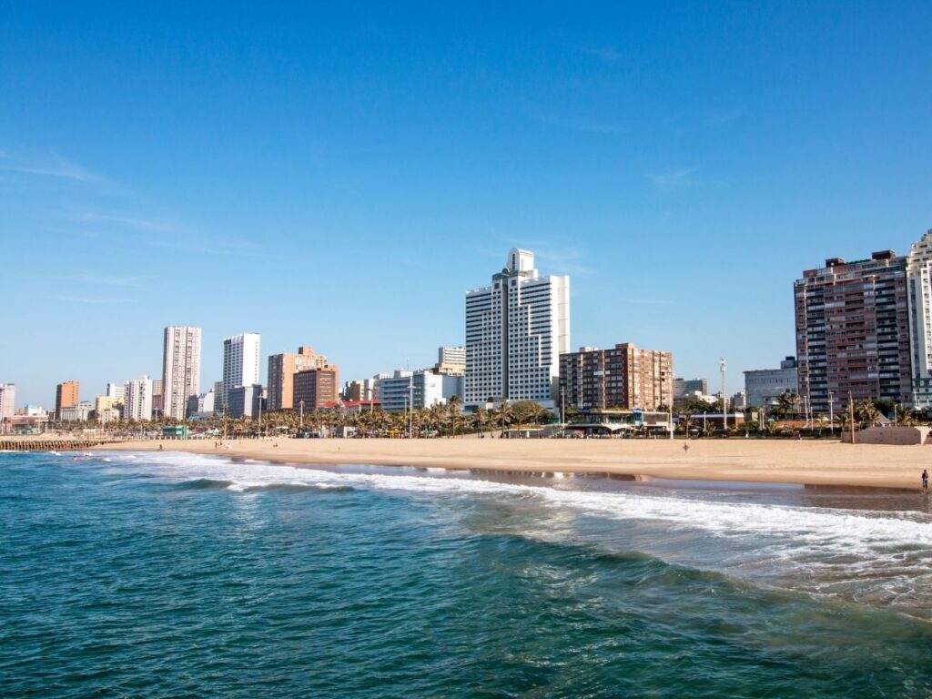 Durban beachfront promenade with palm trees and the Indian Ocean