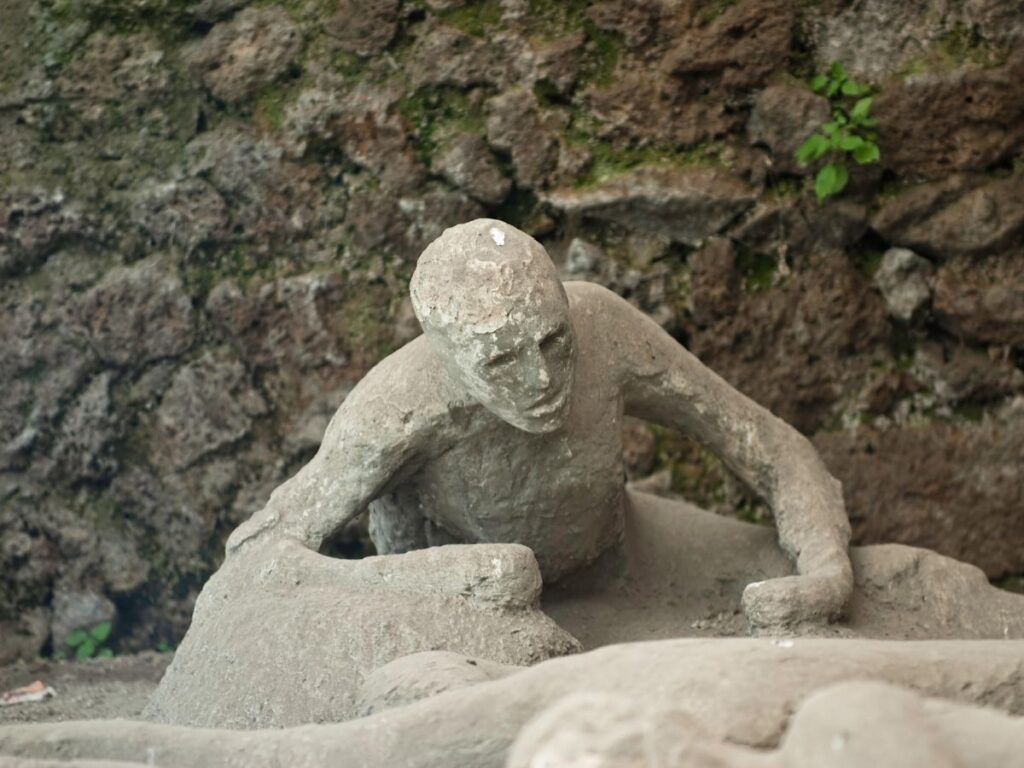 Plaster casts of eruption victims in the Garden of the Fugitives, Pompeii.